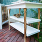 Branch Open Shelf Changing Table in Acacia w/ Snow