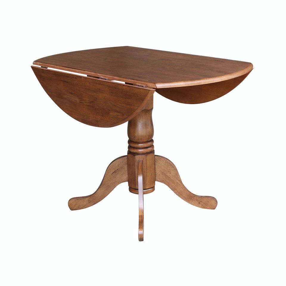 Dining Essentials - Round Drop Leaf Pedestal Table in Bourbon Oak