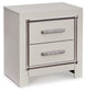 Zyniden King Upholstered Panel Bed with Mirrored Dresser, Chest and Nightstand