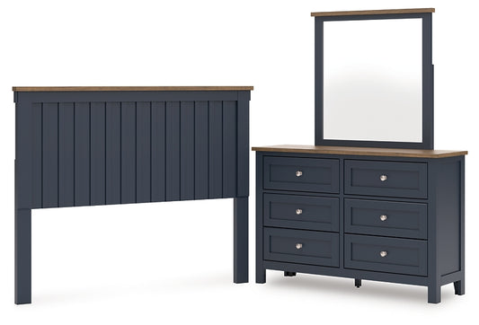 Landocken Queen Panel Headboard with Mirrored Dresser