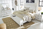 Kanwyn Queen Panel Bed with Storage with Mirrored Dresser, Chest and Nightstand