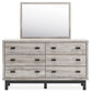 Vessalli Queen Panel Headboard with Mirrored Dresser and Nightstand