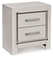 Zyniden King Upholstered Panel Headboard with Mirrored Dresser and Nightstand