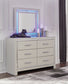 Zyniden Full Upholstered Panel Headboard with Mirrored Dresser and Nightstand