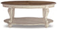 Ashley Express - Realyn Oval Cocktail Table
