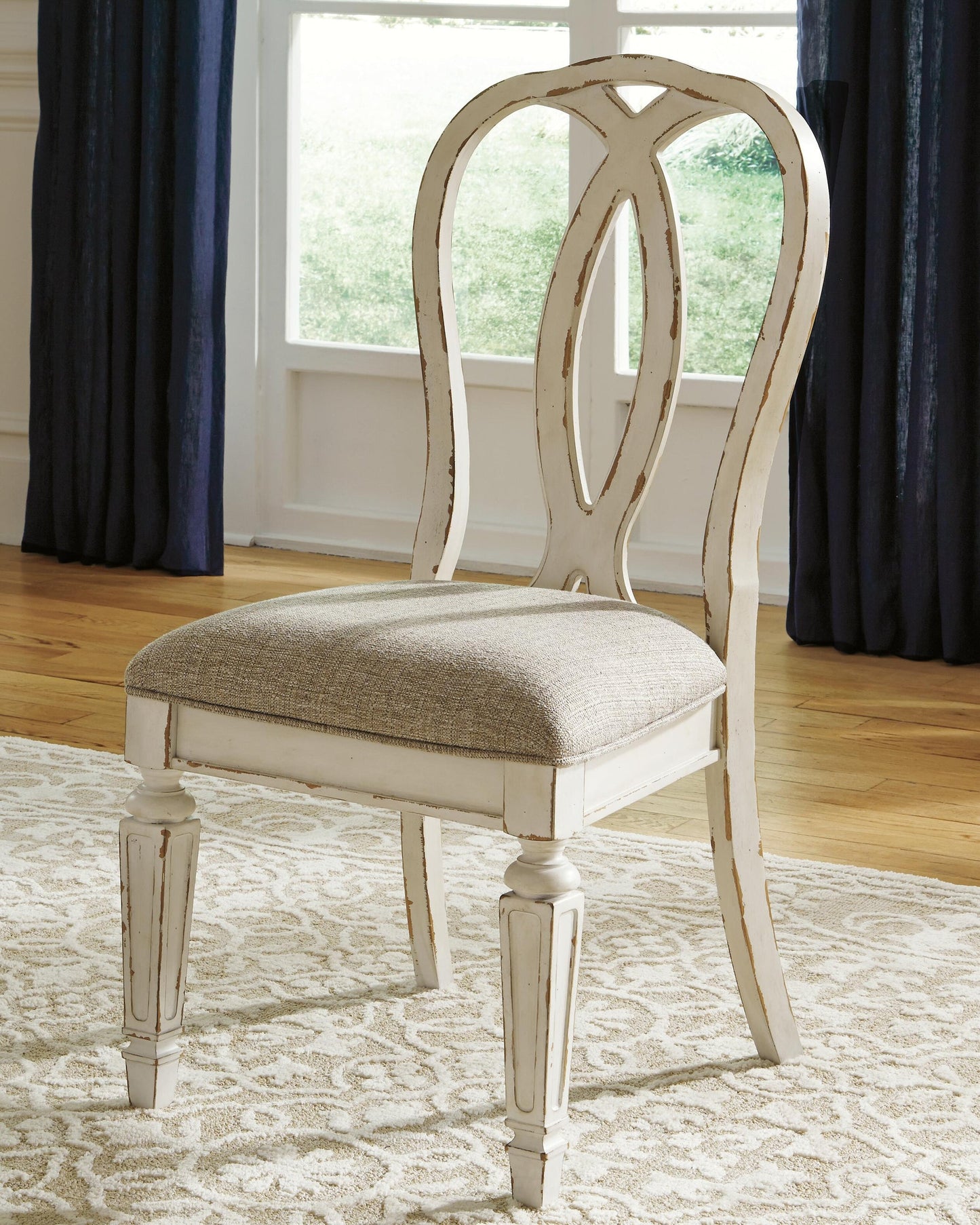 Realyn Dining Table and 4 Chairs