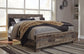 Derekson King Panel Bed with Mirrored Dresser, Chest and Nightstand